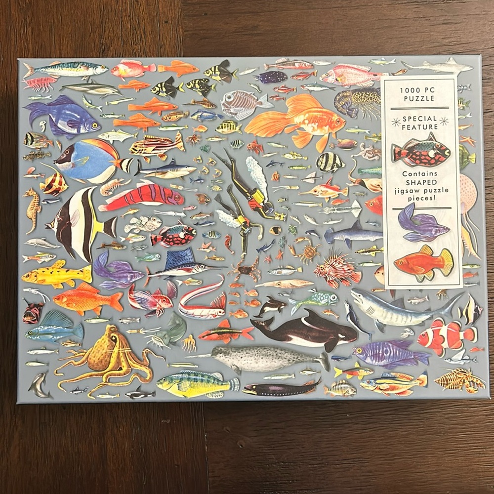 1000 piece Galison Puzzle “Deepest Dive” with shaped pieces